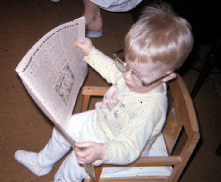 Derek reading Calvinist Contact circa 1970